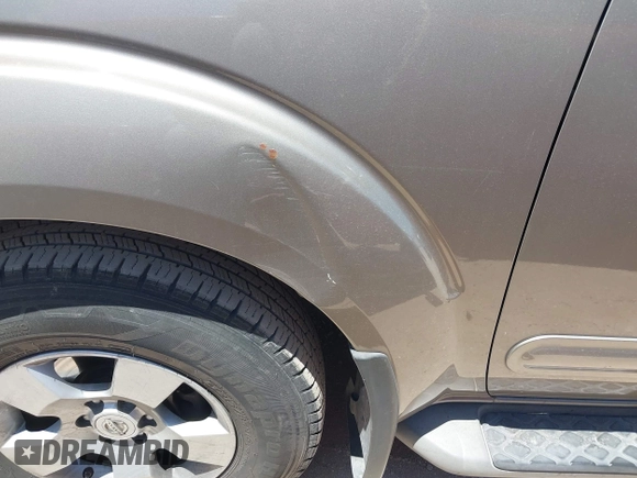2007 Nissan Pathfinder S z VIN 5N1AR18U77C635339, wystawiony jako IAAI lot #42302964 z przebiegiem Nie podano mil oraz . Historia ofert i sprzedaży dostępna na DreamBid. Obrazek 11.