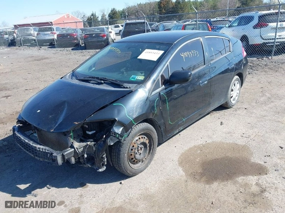 2010 Honda Insight LX with VIN JHMZE2H51AS022064, listed as a IAAI auction lot 41893433 with 263,542 mi miles. Bid and sale history available at carsss.com. Image 2.