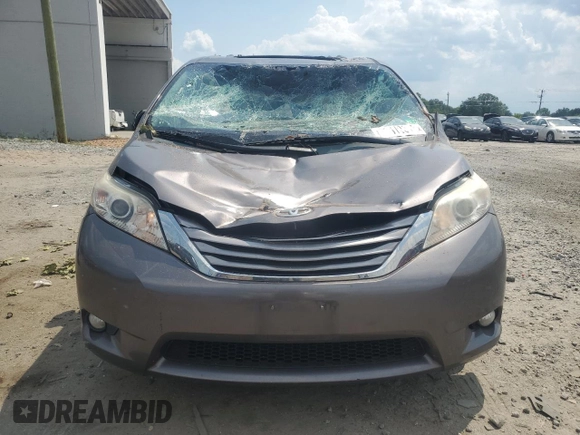 2015 Toyota Sienna XLE with VIN 5TDYK3DC6FS576670, listed as a Copart auction lot 62612345 with 106,475 mi miles and Salvage title. Bid and sale history available at DreamBid. Image 5.