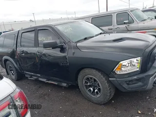2016 Ram 1500 Rebel z VIN 1C6RR7YT0GS100285, wystawiony jako IAAI lot #42346719 z przebiegiem 103 309 mil mil oraz . Historia ofert i sprzedaży dostępna na DreamBid. Obrazek 13.