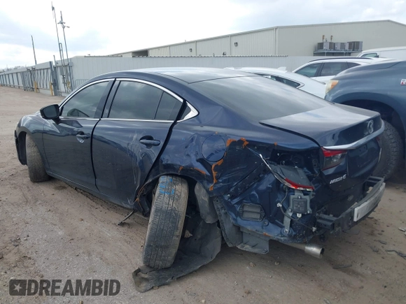 2017 Mazda Mazda6 Touring with VIN JM1GL1V54H1107722, listed as a IAAI auction lot 41521257 with 142,129 mi miles. Bid and sale history available at carsss.com. Image 3.