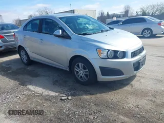 2014 Chevrolet Sonic LT with VIN 1G1JC5SB4E4179448, listed as a IAAI auction lot 41925529 with 74,079 mi miles and . Bid and sale history available at DreamBid. Image 1.