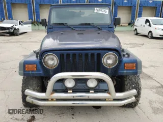2000 Jeep Wrangler Sport z VIN 1J4FA49S1YP713523, wystawiony jako Copart lot #58076745 z przebiegiem 117 112 mil mil oraz Czysty tytuł • Clean title. Historia ofert i sprzedaży dostępna na DreamBid. Obrazek 5.