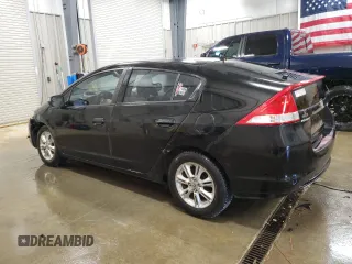 2010 Honda Insight EX z VIN JHMZE2H72AS009647, wystawiony jako Copart lot #60079205 z przebiegiem 157 844 mil mil oraz Czysty tytuł • Clean title. Historia ofert i sprzedaży dostępna na DreamBid. Obrazek 2.