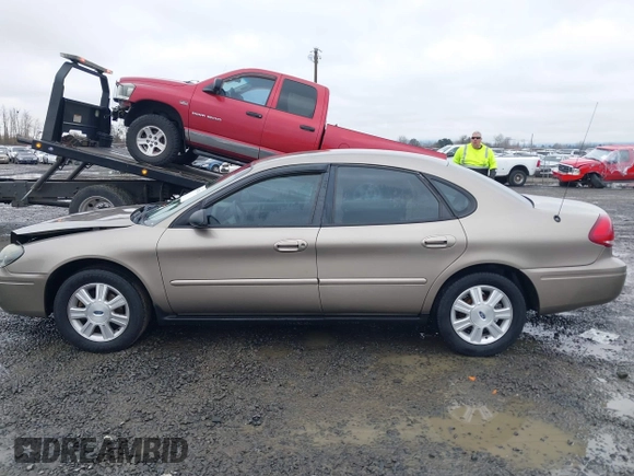 2006 Ford Taurus SE z VIN 1FAFP53U26A197294, wystawiony jako IAAI lot #41506334 z przebiegiem 180 411 mil mil oraz . Historia ofert i sprzedaży dostępna na DreamBid. Obrazek 14.
