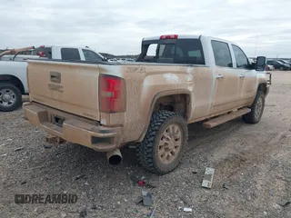 2015 GMC Sierra 2500HD available WiFi Denali with VIN 1GT120E84FF642823, listed as a IAAI auction lot 41593286 with 148,038 mi miles. Bid and sale history available at carsss.com. Image 4.
