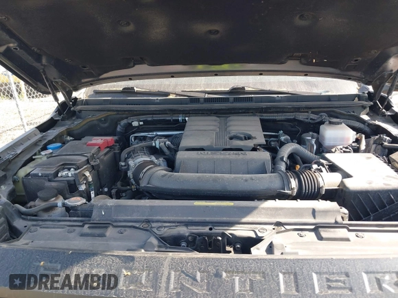 2023 Nissan Frontier Pro-4X z VIN 1N6ED1EK0PN670619, wystawiony jako IAAI lot #42044366 z przebiegiem 26 475 mil mil oraz . Historia ofert i sprzedaży dostępna na DreamBid. Obrazek 10.
