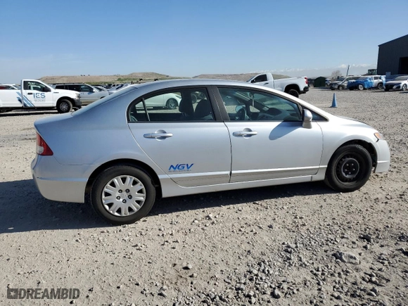 2009 Honda Civic Sdn GX with VIN 1HGFA46599L000884, listed as a Copart auction lot 52988765 with 152,420 mi miles and Clean Title. Bid and sale history available at carsss.com. Image 3.