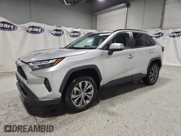 2022 Toyota RAV4 Hybrid XLE Premium with VIN 4T3B6RFV1NU080099, listed as a Copart auction lot 60206905 with 59,859 mi miles and Clean title. Bid and sale history available at DreamBid. Image 1.