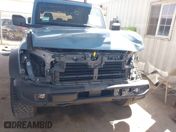 2022 Ford Bronco with VIN 1FMEE5DP9NLB61055, listed as a IAAI auction lot 42359888 with 70,668 mi miles and . Bid and sale history available at DreamBid. Image 6.