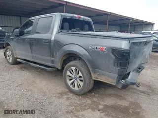 2018 Ford F-150 XL with VIN 1FTEW1EP2JFB56443, listed as a IAAI auction lot 41064561 with 105,215 mi miles. Bid and sale history available at carsss.com. Image 3.