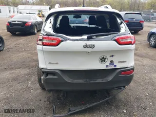 2016 Jeep Cherokee North with VIN 1C4PJMCS6GW120702, listed as a IAAI auction lot 41983998 with 77,060 mi miles. Bid and sale history available at carsss.com. Image 6.