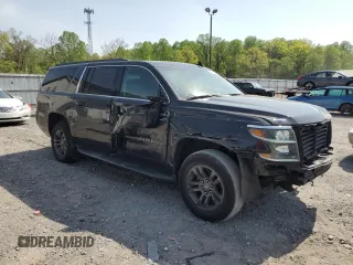 2019 Chevrolet Suburban LT with VIN 1GNSCHKC2KR167309, listed as a Copart auction lot 54475565 with 140,552 mi miles and Salvage Title. Bid and sale history available at DreamBid. Image 4.