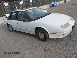 1995 Saturn SL z VIN 1G8ZJ527XSZ125964, wystawiony jako IAAI lot #42110703 z przebiegiem 241 899 mil mil oraz . Historia ofert i sprzedaży dostępna na DreamBid. Obrazek 1.