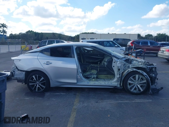 2021 Nissan Maxima SV with VIN 1N4AA6CV3MC506170, listed as a IAAI auction lot 41513574 with Not Provided miles and . Bid and sale history available at DreamBid. Image 14.