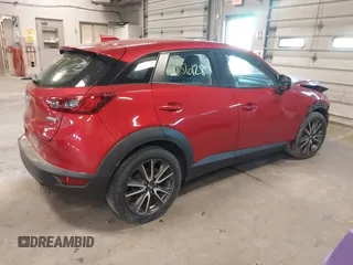 2017 Mazda CX-3 Touring with VIN JM1DKFC73H0175023, listed as a IAAI auction lot 41561287 with 110,669 mi miles. Bid and sale history available at carsss.com. Image 4.