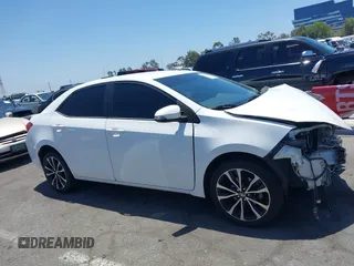 2017 Toyota Corolla L with VIN 5YFBURHE0HP678511, listed as a IAAI auction lot 42519019 with 105,859 mi miles and . Bid and sale history available at DreamBid. Image 14.