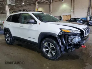 2015 Jeep Cherokee Trailhawk with VIN 1C4PJMBS2FW770370, listed as a Copart auction lot 50920795 with 170,119 mi miles and Clean Title. Bid and sale history available at carsss.com. Image 4.