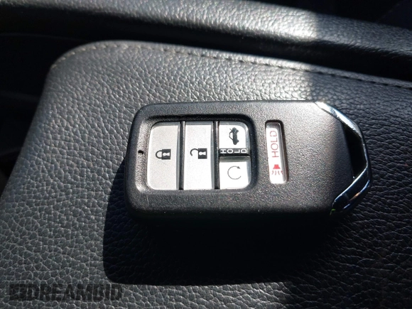 2019 Honda Civic Sport with VIN 2HGFC2F8XKH598141, listed as a IAAI auction lot 42013724 with 98,401 mi miles and . Bid and sale history available at DreamBid. Image 11.