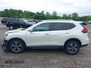 2017 Nissan Rogue SV with VIN 5N1AT2MVXHC844775, listed as a IAAI auction lot 42351482 with 87,195 mi miles and . Bid and sale history available at DreamBid. Image 14.