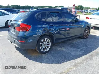 2015 BMW X1 xDrive28i z VIN WBAVL1C57FVY30820, wystawiony jako IAAI lot #40693352 z przebiegiem 111 221 mil mil oraz . Historia ofert i sprzedaży dostępna na DreamBid. Obrazek 4.