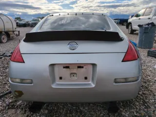 2004 Nissan 350Z Enthusiast z VIN JN1AZ34D54T152775, wystawiony jako Copart lot #56900385 z przebiegiem 182 564 mil mil oraz Szkoda całkowita • Salvage title. Historia ofert i sprzedaży dostępna na DreamBid. Obrazek 6.