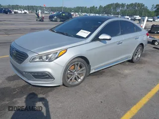 2015 Hyundai Sonata Sport with VIN 5NPE34AB0FH084580, listed as a IAAI auction lot 42150153 with 159,633 mi miles and . Bid and sale history available at carsss.com. Image 2.