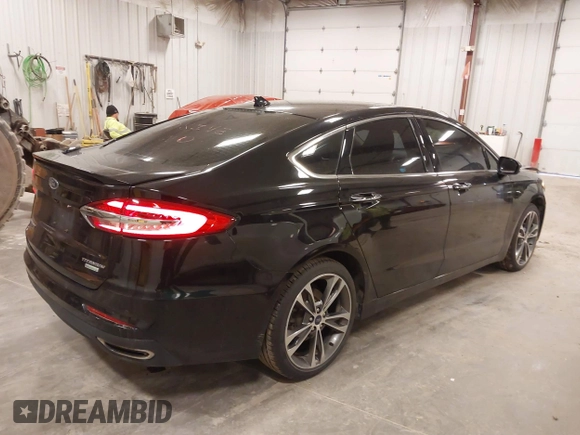2019 Ford Fusion Titanium with VIN 3FA6P0K93KR269569, listed as a IAAI auction lot 41811177 with 110,231 mi miles. Bid and sale history available at carsss.com. Image 4.