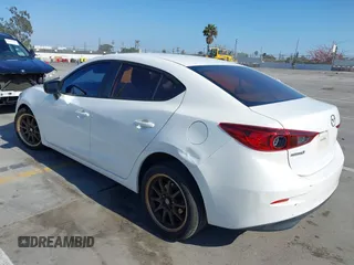 2015 Mazda 3 i SV with VIN JM1BM1T71F1218642, listed as a IAAI auction lot 42142795 with 134,143 mi miles. Bid and sale history available at carsss.com. Image 3.