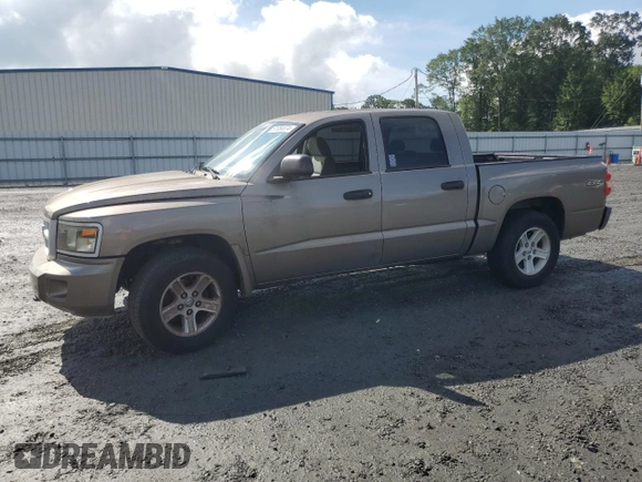 2010 Dodge Dakota Bighorn/Lonestar z VIN 1D7RW3GK7AS223579, wystawiony jako Copart lot #61880374 z przebiegiem 102 134 mil mil oraz Czysty tytuł • Clean title. Historia ofert i sprzedaży dostępna na DreamBid. Obrazek 1.