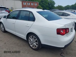 2010 Volkswagen Jetta Wolfsburg Edition with VIN 3VWRJ7AJ1AM152563, listed as a IAAI auction lot 42500824 with 165,125 mi miles and . Bid and sale history available at DreamBid. Image 3.