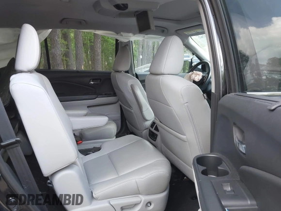 2019 Honda Pilot Touring 7-Passenger with VIN 5FNYF6H60KB030990, listed as a IAAI auction lot 42160762 with 68,807 mi miles and . Bid and sale history available at DreamBid. Image 8.
