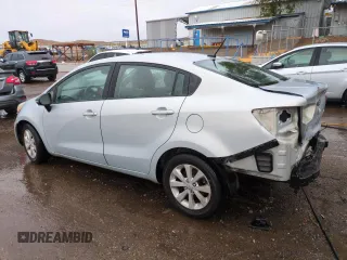 2013 Kia Rio EX with VIN KNADN4A38D6165846, listed as a Copart auction lot 61472955 with 180,536 mi miles and Salvage title. Bid and sale history available at DreamBid. Image 2.