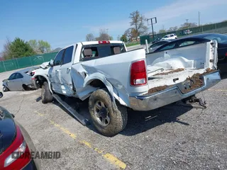 2013 Ram 2500 Laramie Longhorn with VIN 3C6UR5LL7DG522840, listed as a IAAI auction lot 41970385 with 145,144 mi miles and . Bid and sale history available at DreamBid. Image 3.