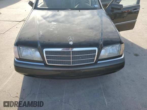 1994 Mercedes-Benz C with VIN WDBHA28E5RF090458, listed as a Copart auction lot 82380184 with Not Provided miles and Salvage Title. Bid and sale history available at carsss.com. Image 12.