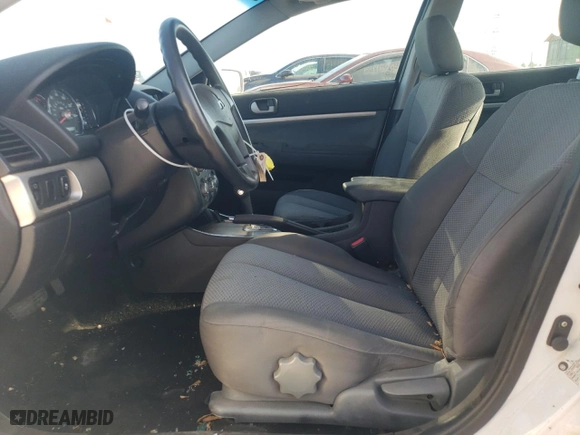 2010 Mitsubishi Galant FE with VIN 4A32B2FF6AE008597, listed as a Copart auction lot 54932304 with 125,195 mi miles and Salvage Title. Bid and sale history available at carsss.com. Image 7.