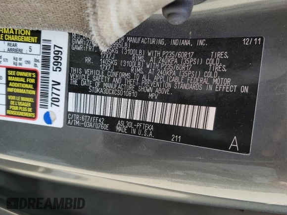 2012 Toyota Sienna z VIN 5TDKA3DCXCS010810, wystawiony jako Copart lot #54872735 z przebiegiem 188 973 mil mil oraz Szkoda całkowita • Salvage title. Historia ofert i sprzedaży dostępna na DreamBid. Obrazek 14.