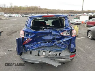 2015 Ford Escape SE with VIN 1FMCU9GX4FUC73125, listed as a IAAI auction lot 42071815 with 71,681 mi miles. Bid and sale history available at carsss.com. Image 6.