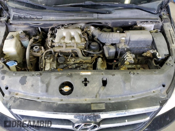2008 Hyundai Entourage GLS z VIN KNDMC233086051923, wystawiony jako Copart lot #47754735 z przebiegiem Nie podano mil oraz Szkoda całkowita • Salvage title. Historia ofert i sprzedaży dostępna na DreamBid. Obrazek 12.