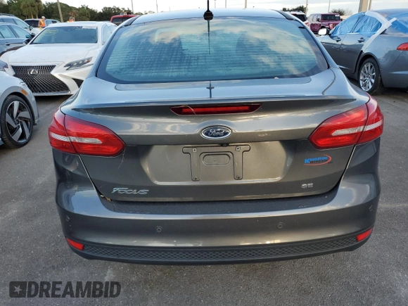 2016 Ford Focus SE with VIN 1FADP3F28GL381277, listed as a Copart auction lot 75605164 with 0 mi miles and Salvage Title. Bid and sale history available at carsss.com. Image 6.