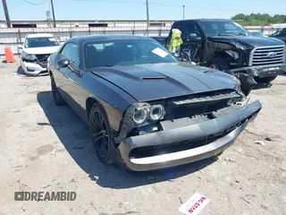 2016 Dodge Challenger SXT z VIN 2C3CDZAG1GH202650, wystawiony jako IAAI lot #41979581 z przebiegiem 114 180 mil mil oraz . Historia ofert i sprzedaży dostępna na DreamBid. Obrazek 1.