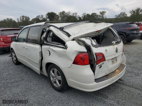 2009 Volkswagen Routan SE with VIN 2V8HW34139R582544, listed as a Copart auction lot 74354054 with 136,528 mi miles and Salvage Title. Bid and sale history available at carsss.com. Image 2.