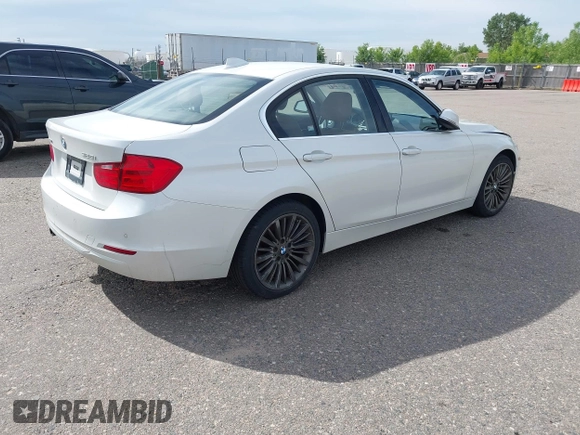 2013 BMW 3 Series 328i xDrive with VIN WBA3B5C52DF599074, listed as a IAAI auction lot 42408547 with 158,050 mi miles and . Bid and sale history available at DreamBid. Image 4.