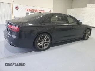 2017 Audi A8 Sport z VIN WAU43AFD4HN020515, wystawiony jako Copart lot #44953055 z przebiegiem 115 422 mil mil oraz Szkody całkowita. Historia ofert i sprzedaży dostępna na DreamBid. Obrazek 3.