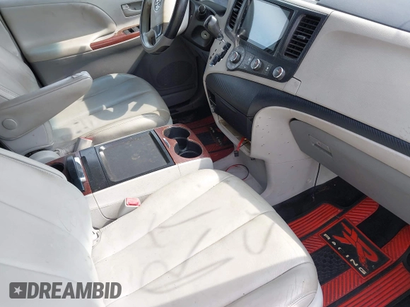 2014 Toyota Sienna L with VIN 5TDZK3DC0ES445088, listed as a IAAI auction lot 42443966 with Not provided miles and . Bid and sale history available at DreamBid. Image 5.