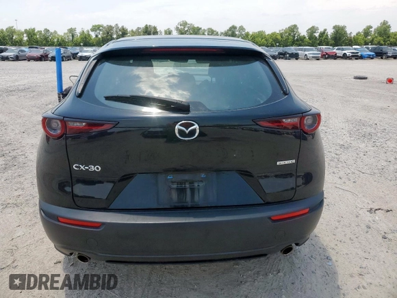 2021 Mazda CX-30 S with VIN 3MVDMAAL9MM273086, listed as a Copart auction lot 57276845 with 79,432 mi miles and Salvage title. Bid and sale history available at DreamBid. Image 6.