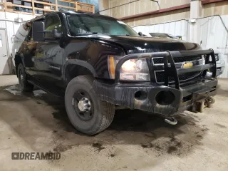 2013 Chevrolet Suburban with VIN 1GNWK5EG4DR246825, listed as a Copart auction lot 56764205 with 162,459 mi miles and Salvage title. Bid and sale history available at DreamBid. Image 4.