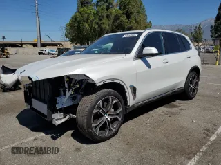 2025 BMW X5 sDrive40i with VIN 5UX13EU05S9Y44938, listed as a Copart auction lot 62958905 with 2,832 mi miles and Salvage title. Bid and sale history available at DreamBid. Image 1.