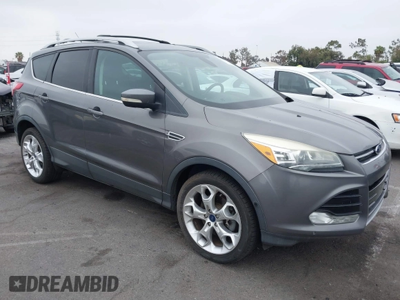 2013 Ford Escape Titanium with VIN 1FMCU0J9XDUD86354, listed as a IAAI auction lot 42420780 with 260,995 mi miles and . Bid and sale history available at DreamBid. Image 1.