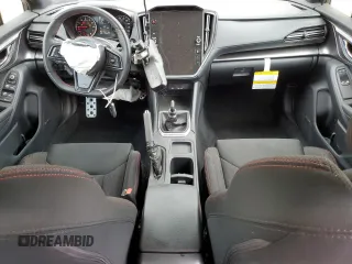 2023 Subaru WRX Premium z VIN JF1VBAF64P9815296, wystawiony jako Copart lot #56977025 z przebiegiem 35 231 mil mil oraz Szkoda całkowita • Salvage title. Historia ofert i sprzedaży dostępna na DreamBid. Obrazek 8.